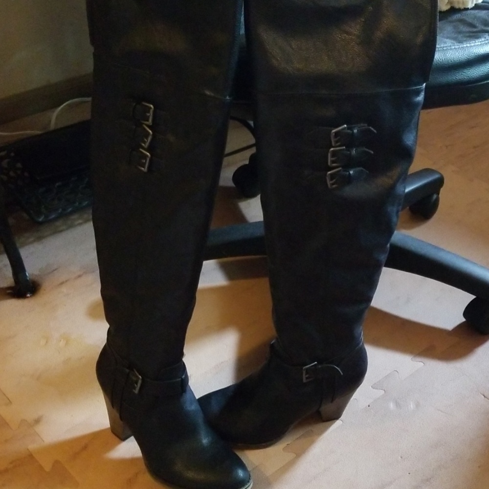 Thigh high leather boots